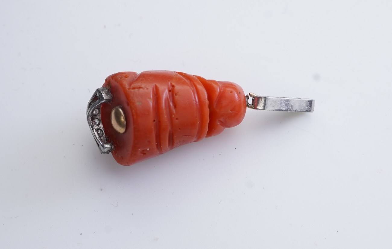 An Art Deco carved coral and diamond pendant, 1920s